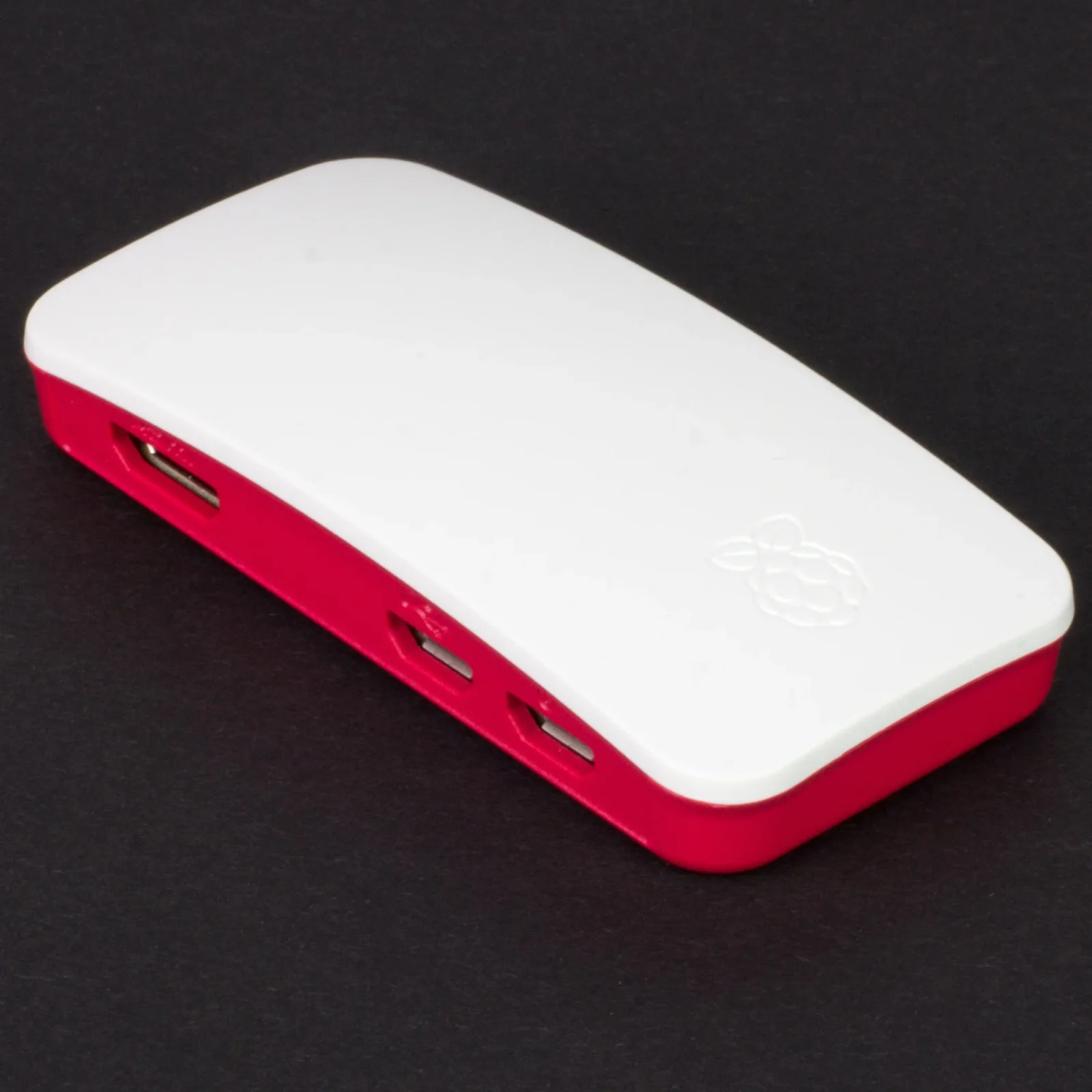 The Rhythm LightHub Zero — a compact white-and-red Matter hub